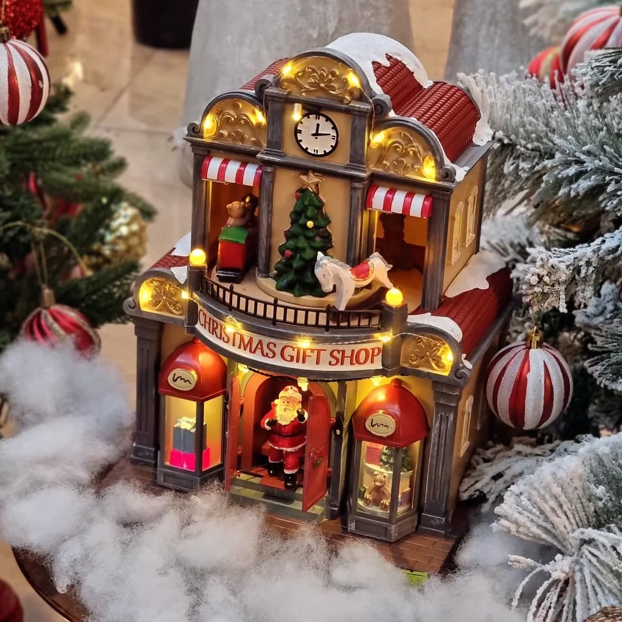 12" Animated Christmas Village House with LED Lights & Music - Spinning Train, Dynamically Moving Santa, Handpainted Resin Shop for Indoor Home Tabletop Decor