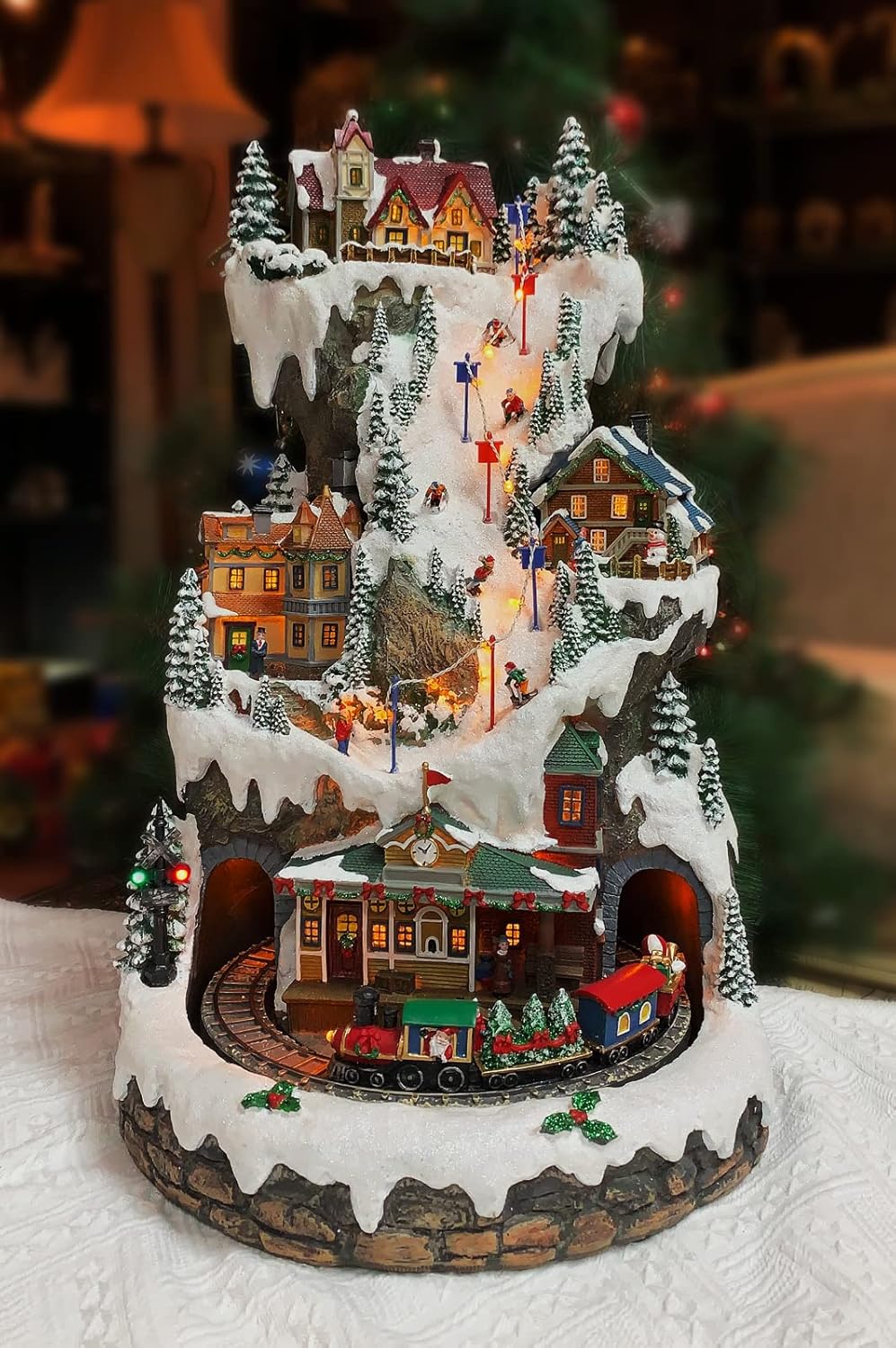 MOMENTS IN TIME 20.5“H Ski Resort Mountain Resin Christmas Village Buildings, Featuring LED Lights, Christmas Music, and Animated Train - Power Adapter (Included)